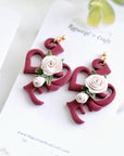 Love Script earrings